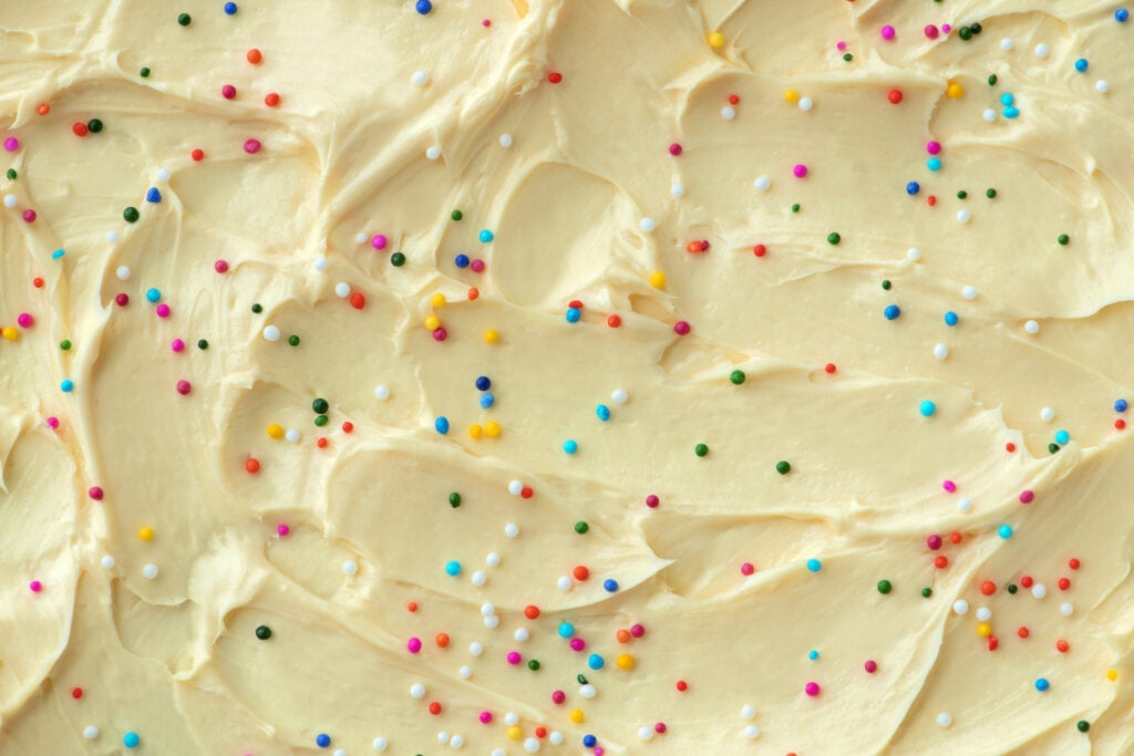 Cake frosting with sprinkles on top