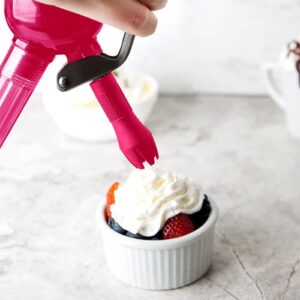 Whipped cream and fruit whipped by a cream dispenser 